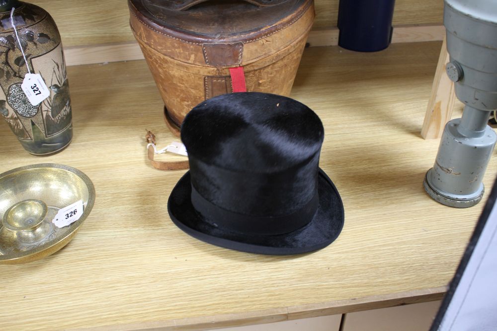 A moleskin top hat in a leather box by Christys London, J. Norton, Haywards Heath, Internal dimensions 15 x 19cm